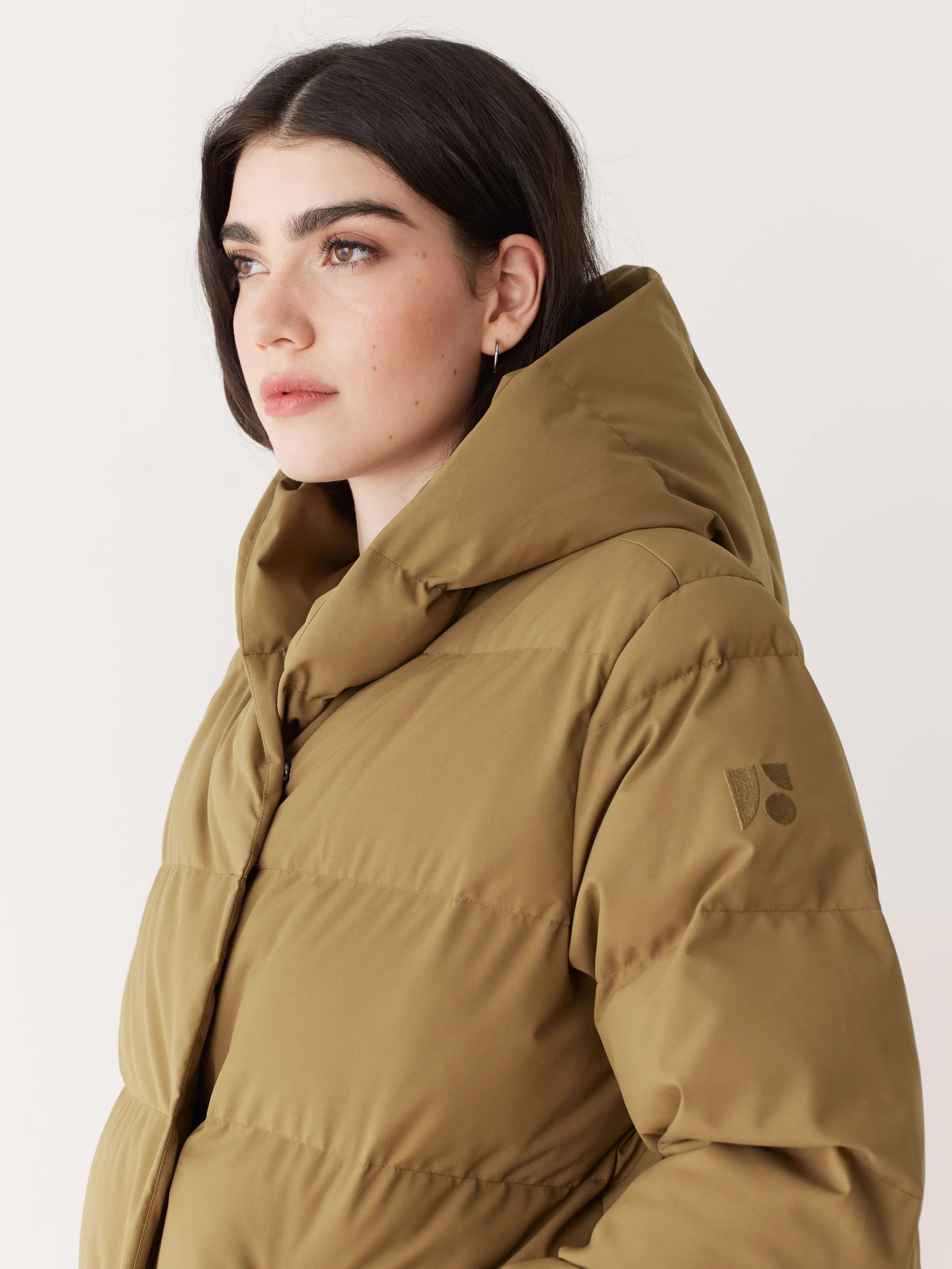 The Highland Long Puffer Coat in Amber Brown